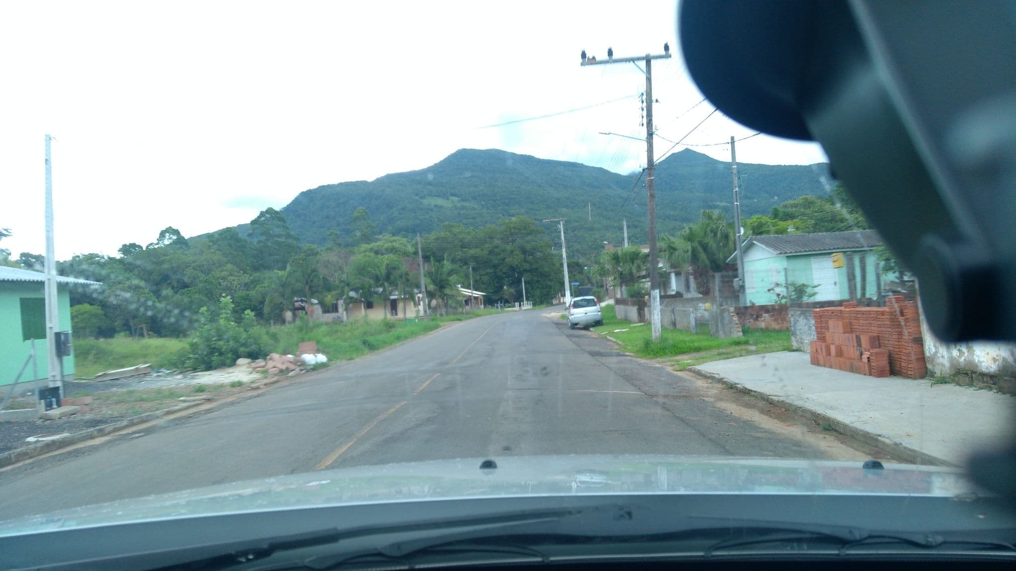 Street view near Pousada Manacá dos Canyos, Mampituba — © akawabat (CC BY-SA · Mapillary)