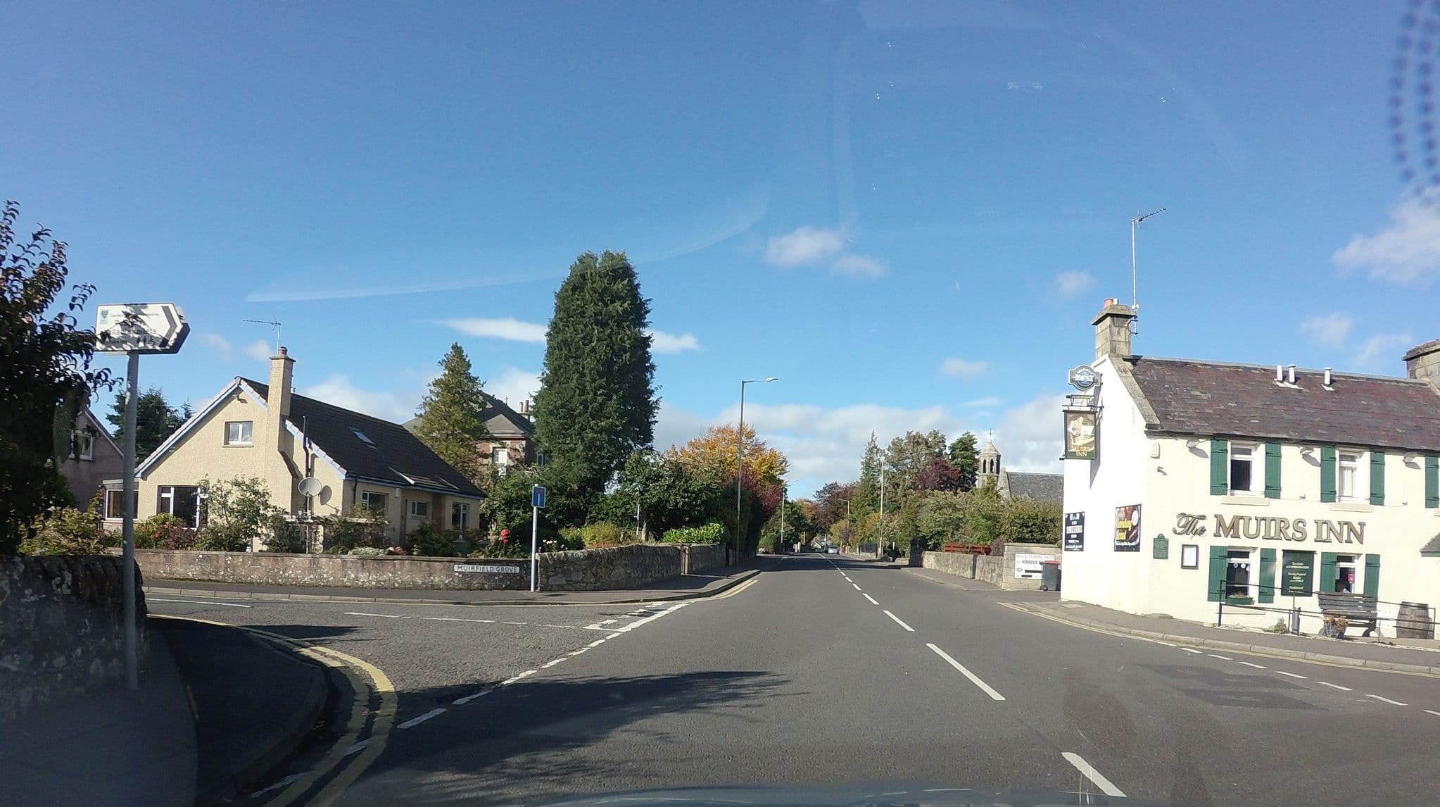 Street view near The Muirs Inn, Kinross — © hobgoblin (CC BY-SA · Mapillary)