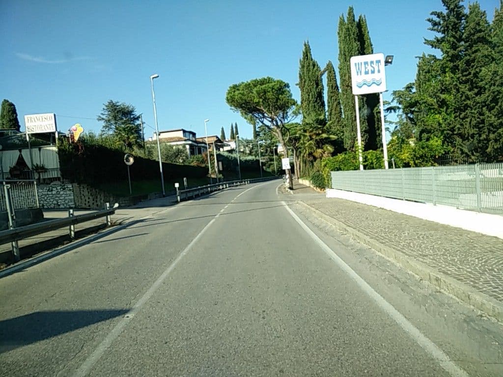 Street view near Hotel Francesco, Padenghe sul Garda — © joostjakob (CC BY-SA · Mapillary)